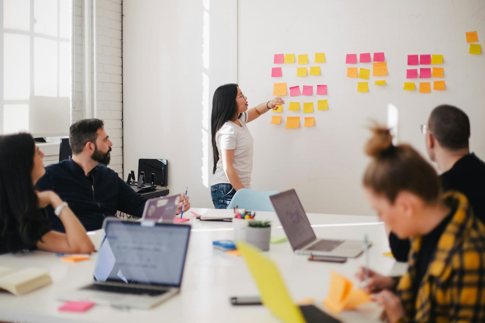Engineering team in a standup planning session